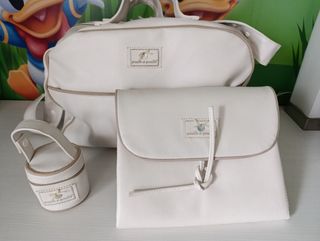 Bolso, cambiador y chupetero pasito a pas