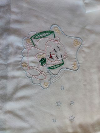 Juego de sábanas de cuna