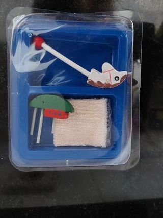 Giocattoli e altri accessori per case delle bambole in miniatura
