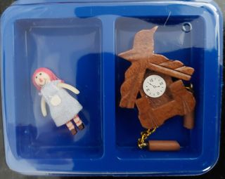 Giocattoli e altri accessori per case delle bambole in miniatura