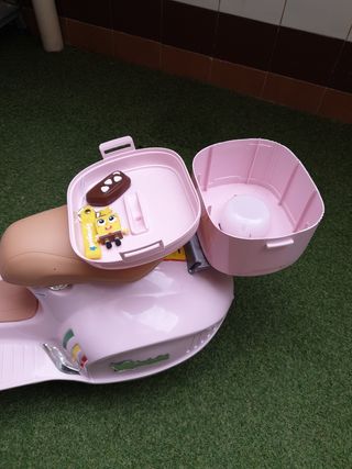 Moto electrica infantil con su caja