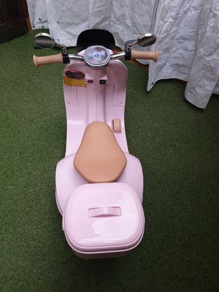 Moto electrica infantil con su caja
