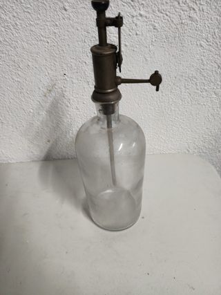 Antigua botella dosificadora