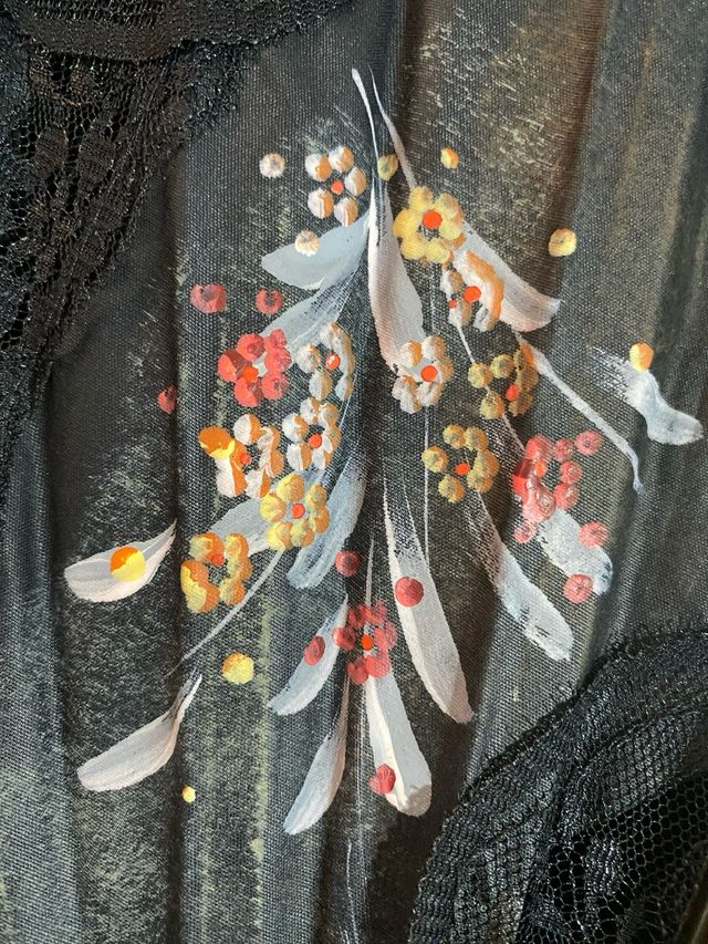 Dos abanico negros con encaje