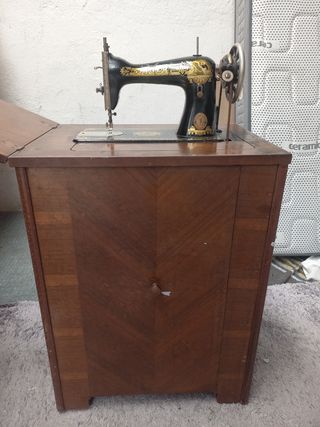 Máquina de coser singer con mueble