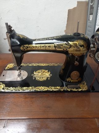 Máquina de coser singer con mueble