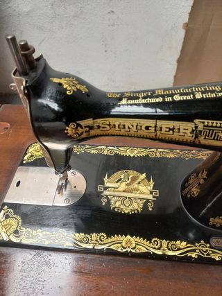 Máquina de coser singer con mueble