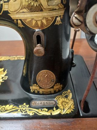 Máquina de coser singer con mueble