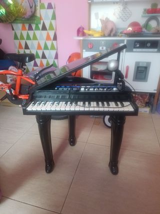 Piano juguete niño con micrófono