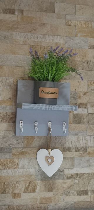 Colgador para llaves gris y blanco, nuevo.