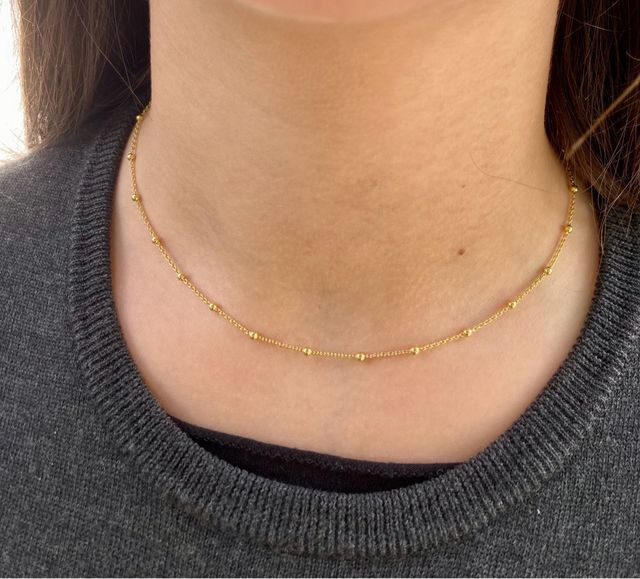 Catenina a palline in argento dorato