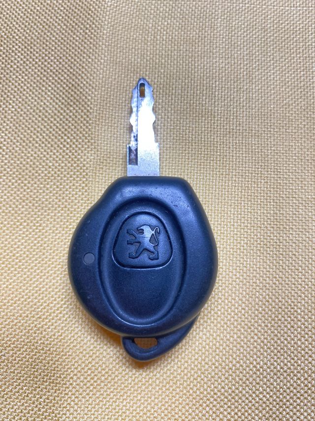 Llave de peugeot original