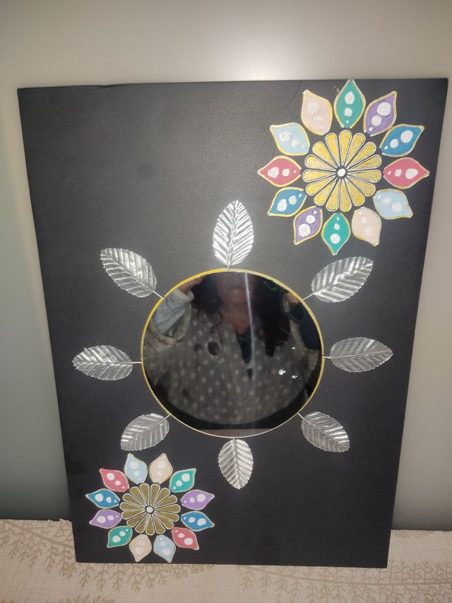 Lienzo con mandalas y espejo