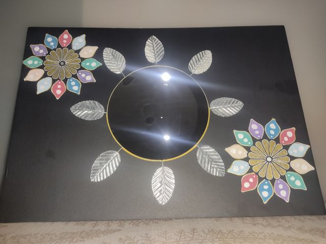 Lienzo con mandalas y espejo