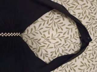 Vestido cóctel negro. 38