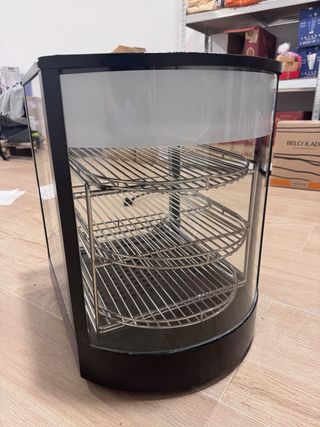 Vitrina caliete(NO BAJO PRECIO,TIENEUNMES DE USO)