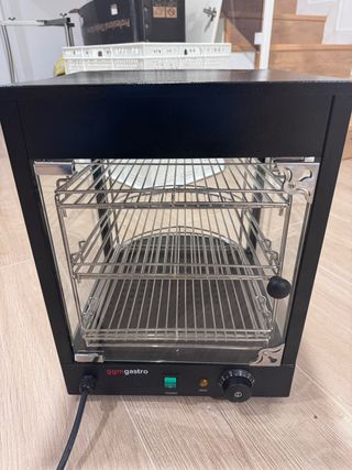 Vitrina caliete(NO BAJO PRECIO,TIENEUNMES DE USO)