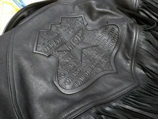 Chaqueta moto cuero flecos