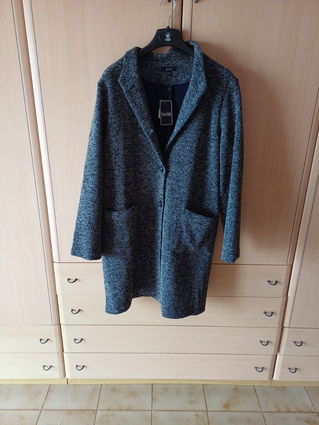 Spolverino nuovo con cartellino