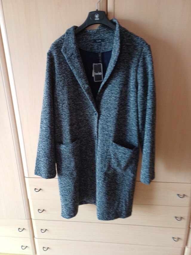 Spolverino nuovo con cartellino