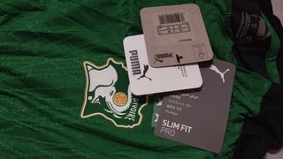 Camiseta de costa de marfil