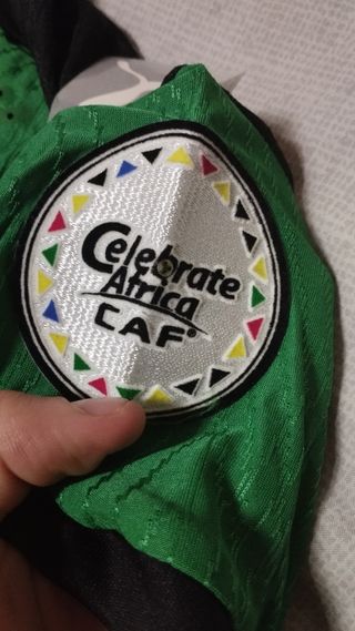 Camiseta de costa de marfil