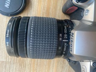 Cama Nikon F65, objetivo 28-80 y funda