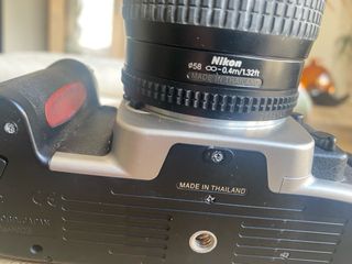 Cama Nikon F65, objetivo 28-80 y funda