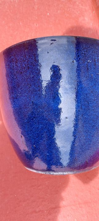 Conjunto de macetas de terracota vidriada azul