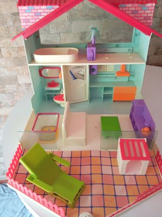 Maletín casa muñecas barriguitas