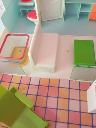 Maletín casa muñecas barriguitas