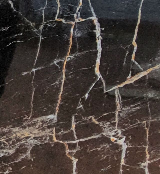 Rebajado. Porcelanico negro imitación marmol