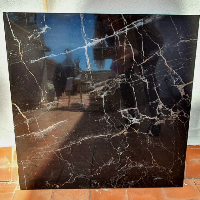 Rebajado. Porcelanico negro imitación marmol