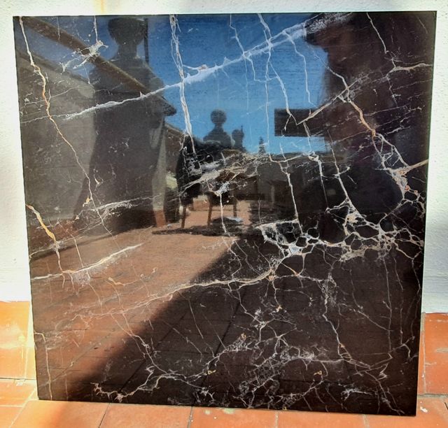 Rebajado. Porcelanico negro imitación marmol