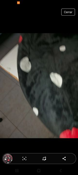 Manta reversible negra con estampado roj