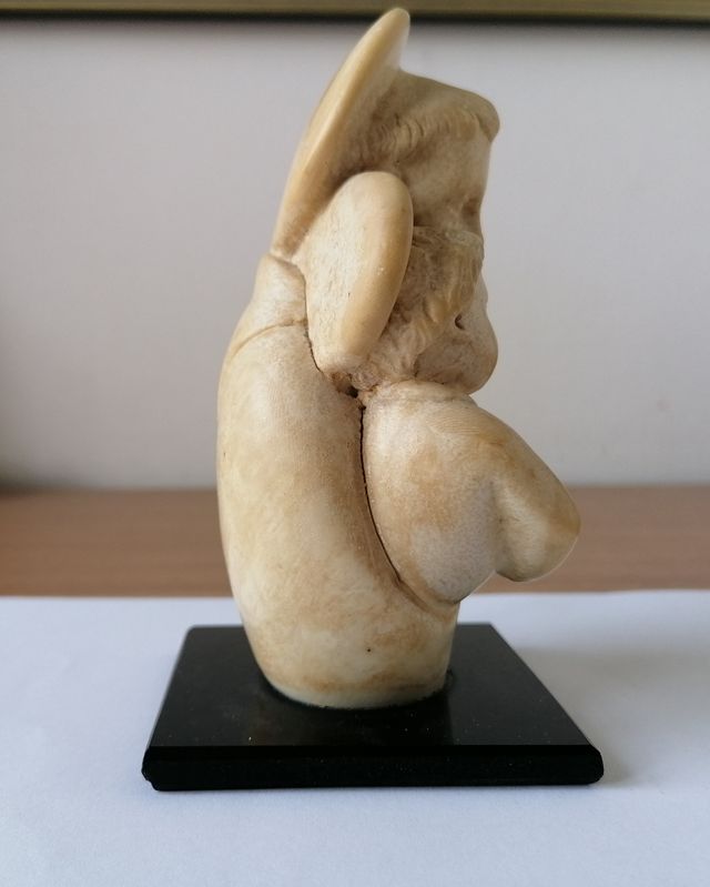 Statuetta soprammobile con angeli e mazzo di fiori