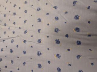 Colcha de flores de la marca Bassols, como nueva