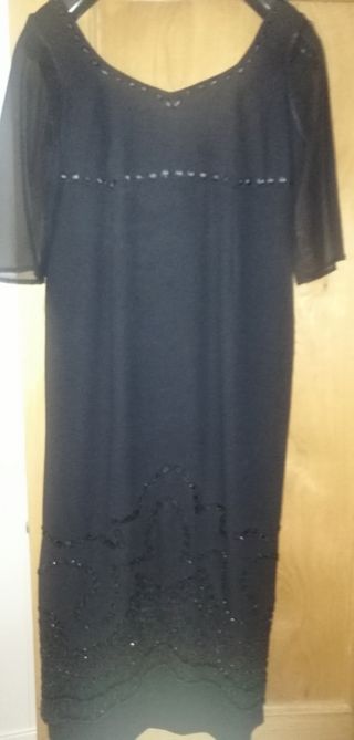 TRAJE DE MADRINA NEGRO. RESTOS TIENDA.