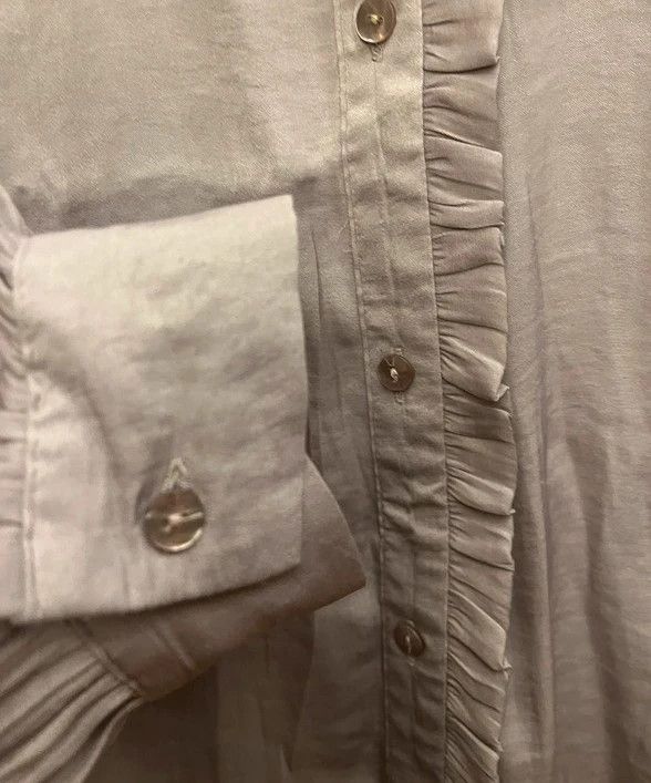 blusa cuello bolantes cisne de Sfera, M. lila