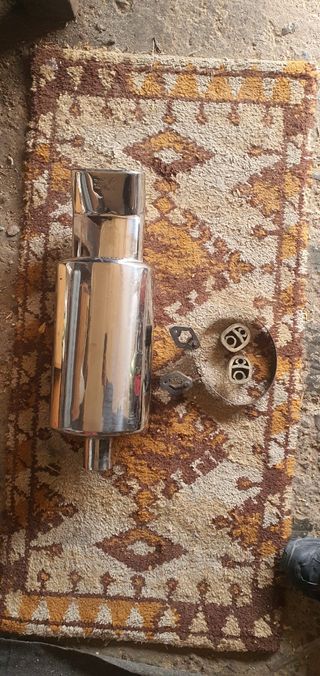 Cola de escape Xcese