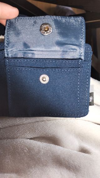 Cartera Stussy azul y blanca