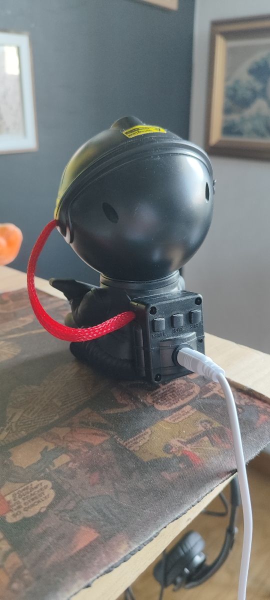 Mini proyector astronauta LED