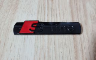 Emblema metal adhesivo,logo SLine Audi.Color negro