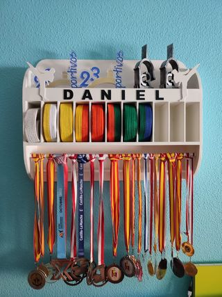 Expositor cinturones y medallero