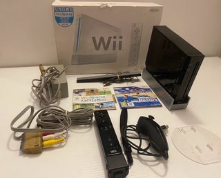 Nintendo Wii con 2 stazioni di ricarica controller