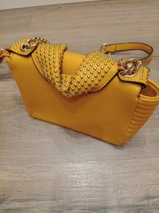 Bolso cazadora de cuero amarillo