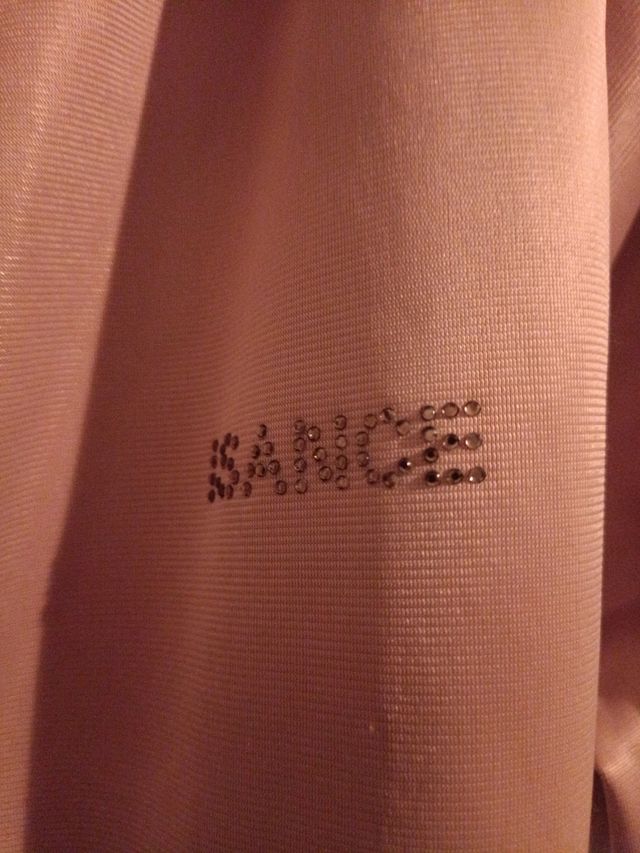 Chaqueta deportiva chica  con cremallera y capucha