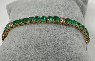 Pulsera de oro rosa de 18 kt con esmeraldas