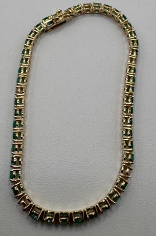 Pulsera de oro rosa de 18 kt con esmeraldas