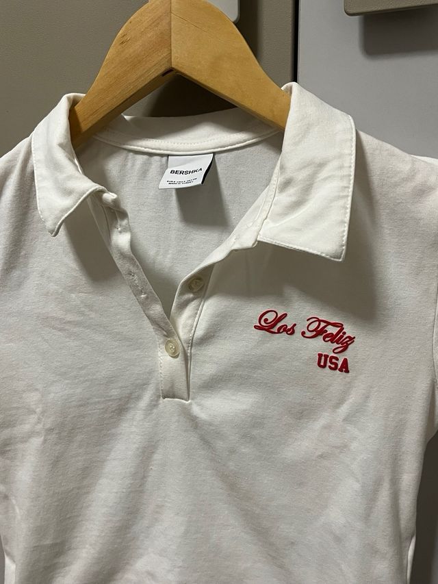 T-shirt polo bianca stretta e corta Taglia S